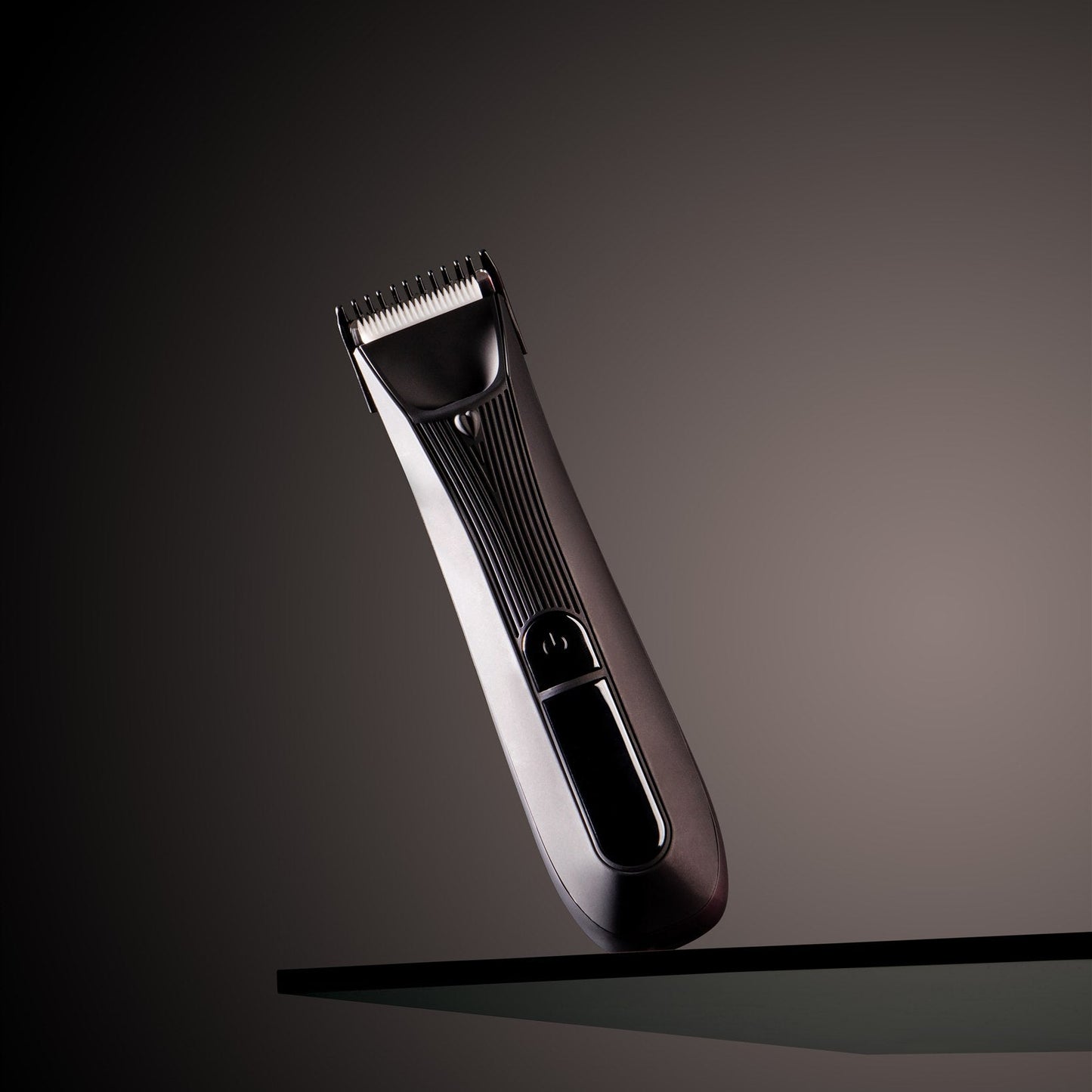 Hair trimmer on a dark background