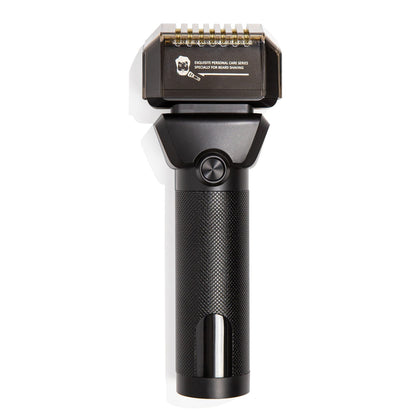 Black electric shaver on a white background