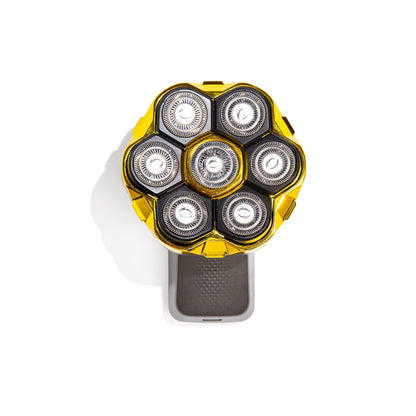 Shaver head with multiple circular components on a white background