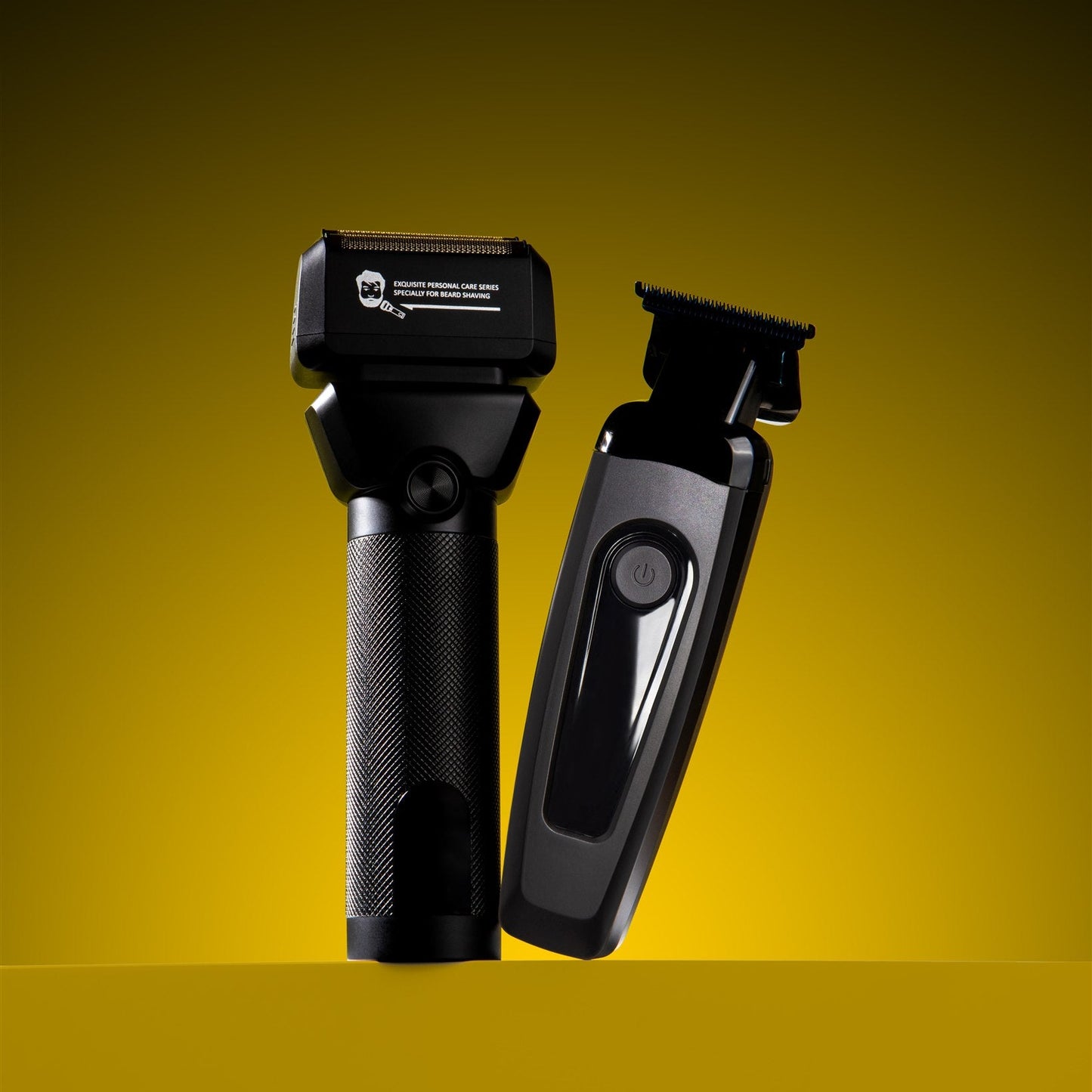 Two black grooming tools on a yellow background