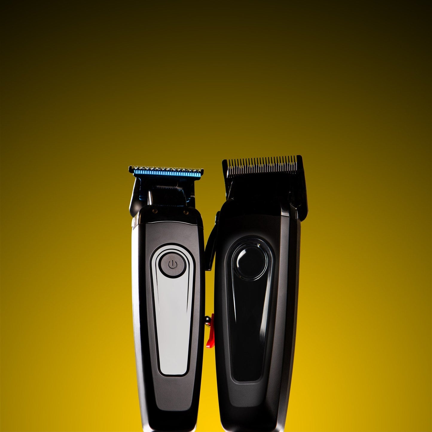 Two hair trimmers on a yellow background
