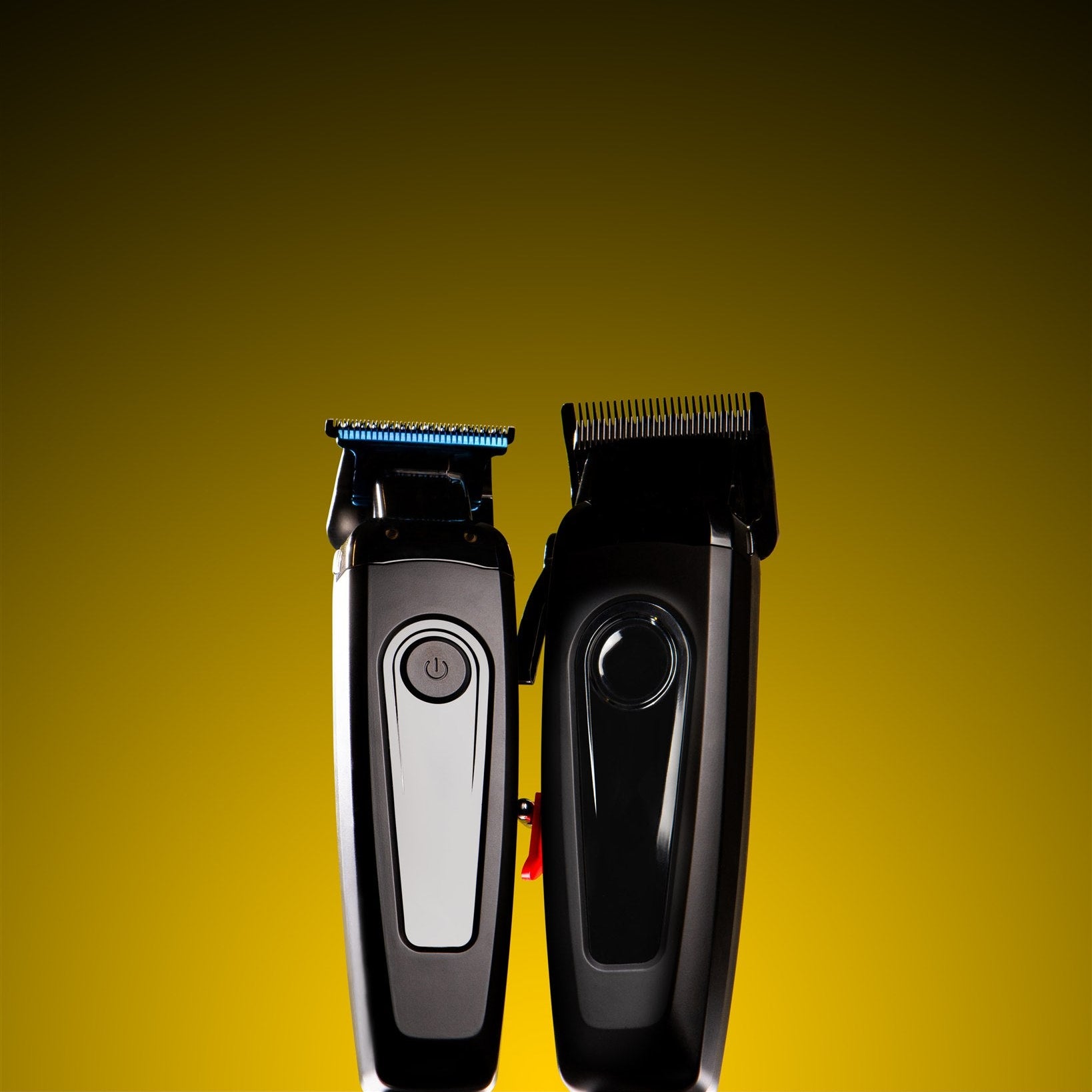 Two hair trimmers on a yellow background