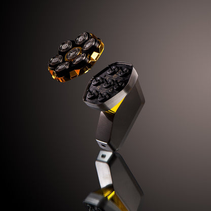 Shaver head with multiple blades on a dark background