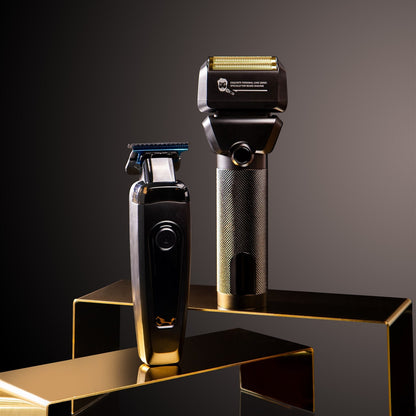 Two electric shavers, one black and one gold, on a reflective surface with a dark background.