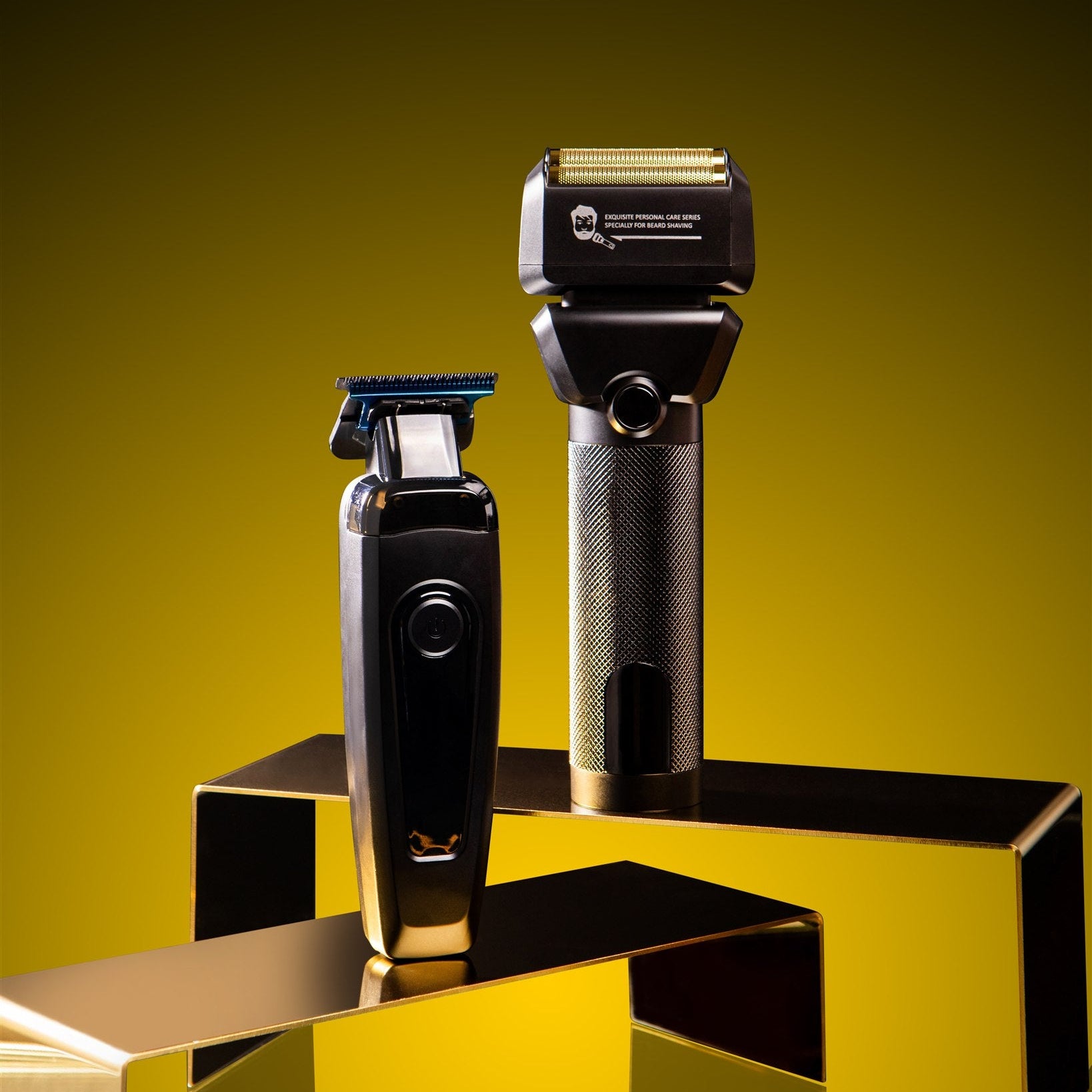 Two electric razors on a reflective gold surface with a yellow gradient background