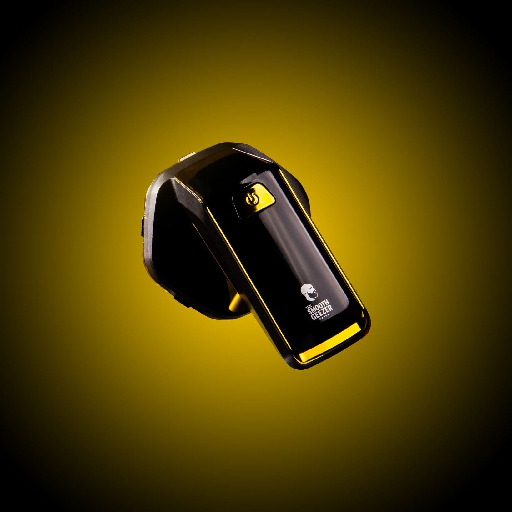 Black and yellow Bluetooth headset on a gradient yellow background